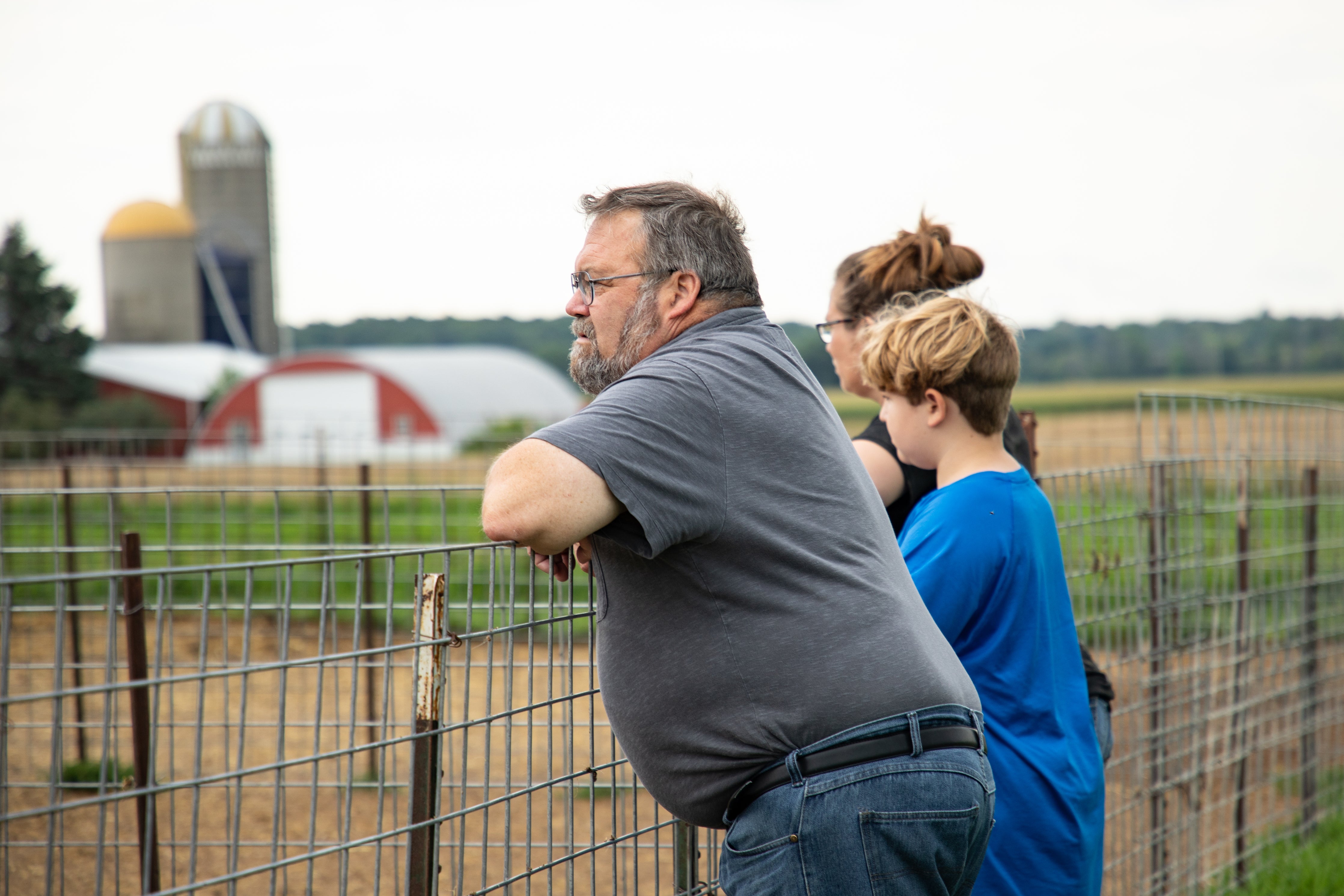 Larry Hedrich with his family looking over Calanna homestead.